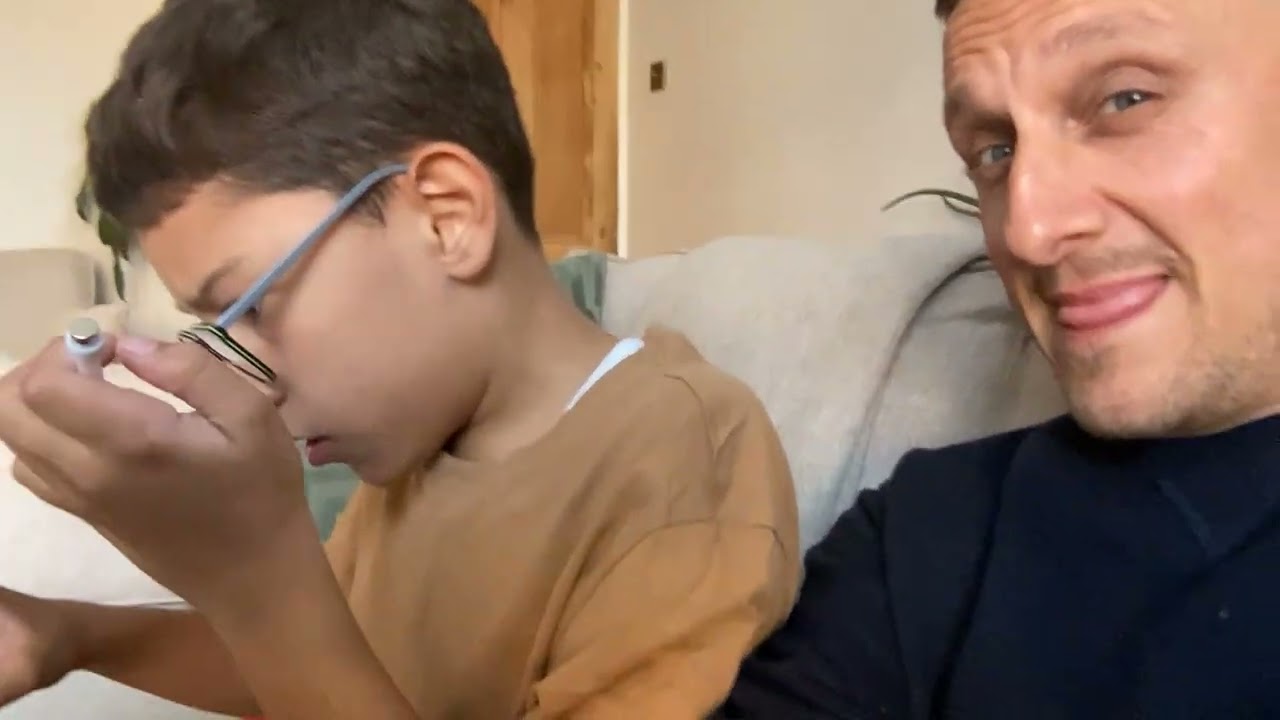 I unbox a black web shooter with my step dad