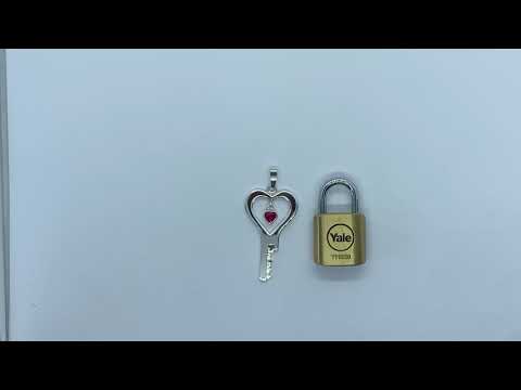 The Lovin Locktober chastity key in silver with padlock